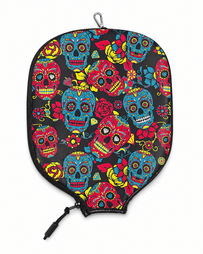 Colorful skull-patterned pickleball paddle cover on a white background