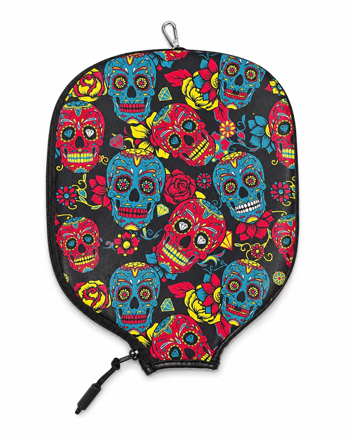 Colorful skull-patterned pickleball paddle cover on a white background