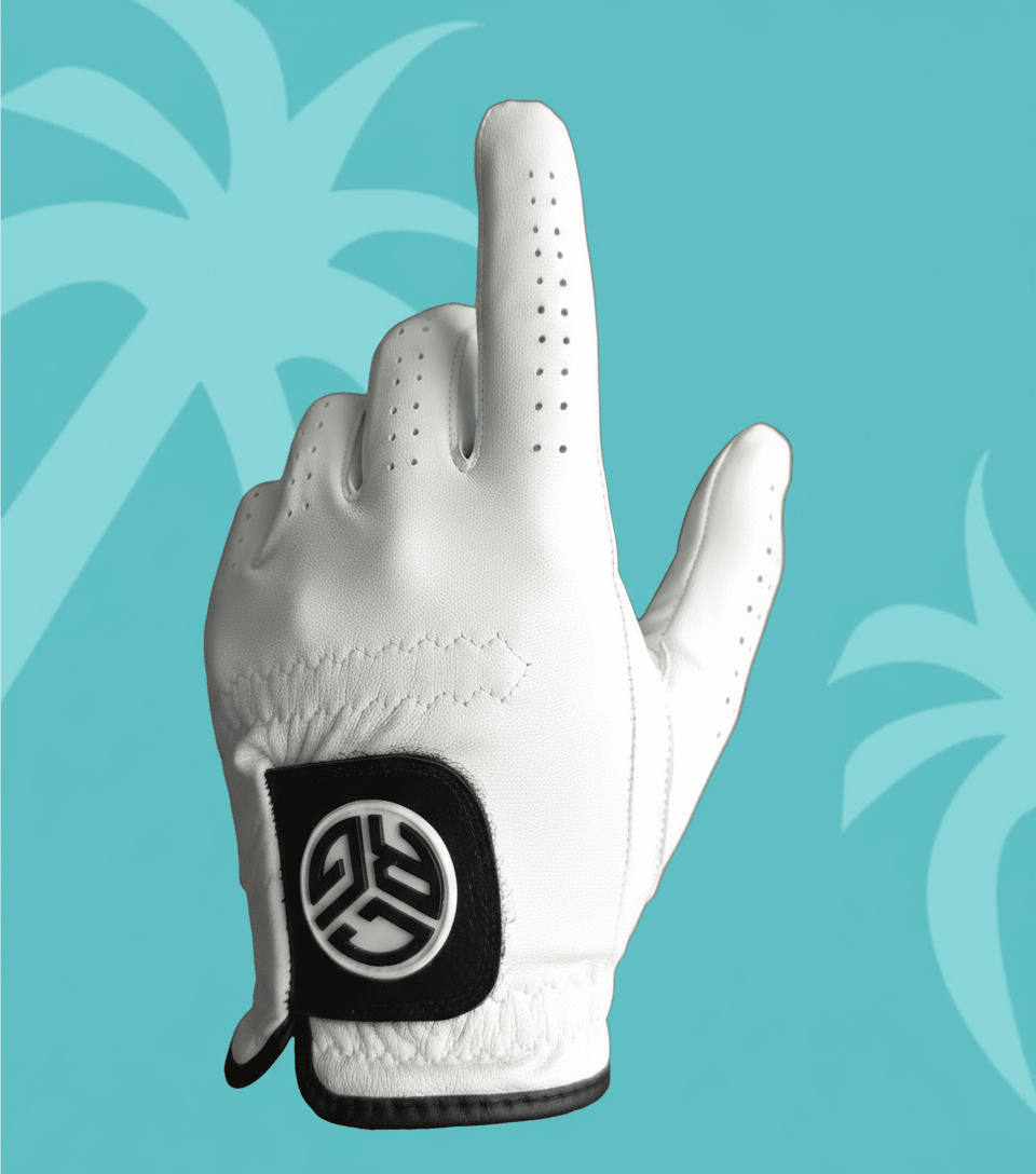 White golf glove with a black logo on a blue background with palm tree silhouettes