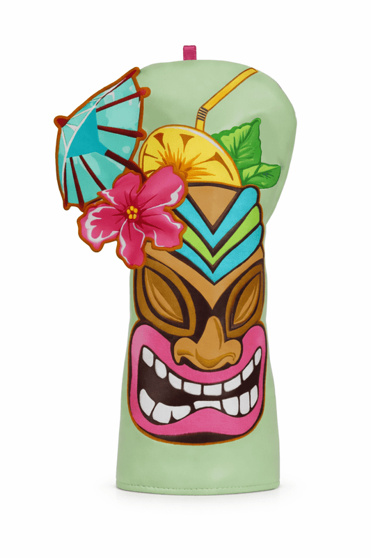 Colorful tiki mug with decorative elements on a white background