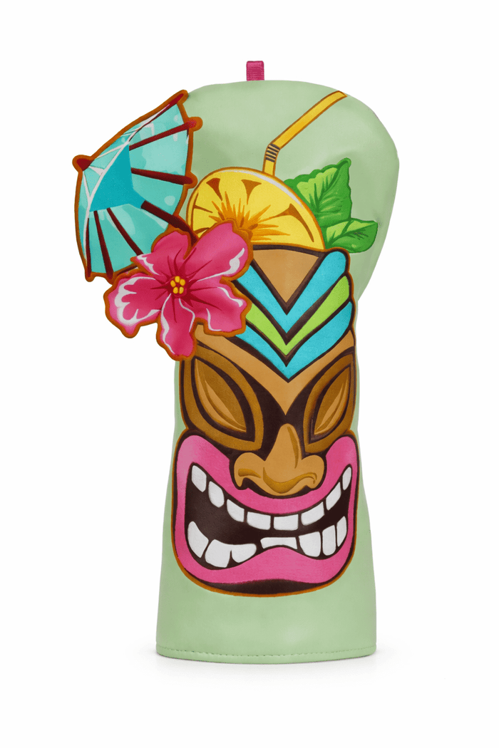 Colorful tiki mug with decorative elements on a white background