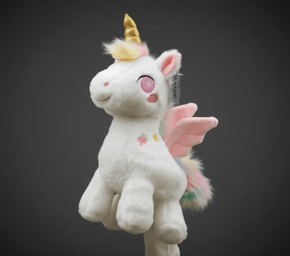 Unicorn golf club headcover with golden horn, pink wings, and pastel tail on dark background