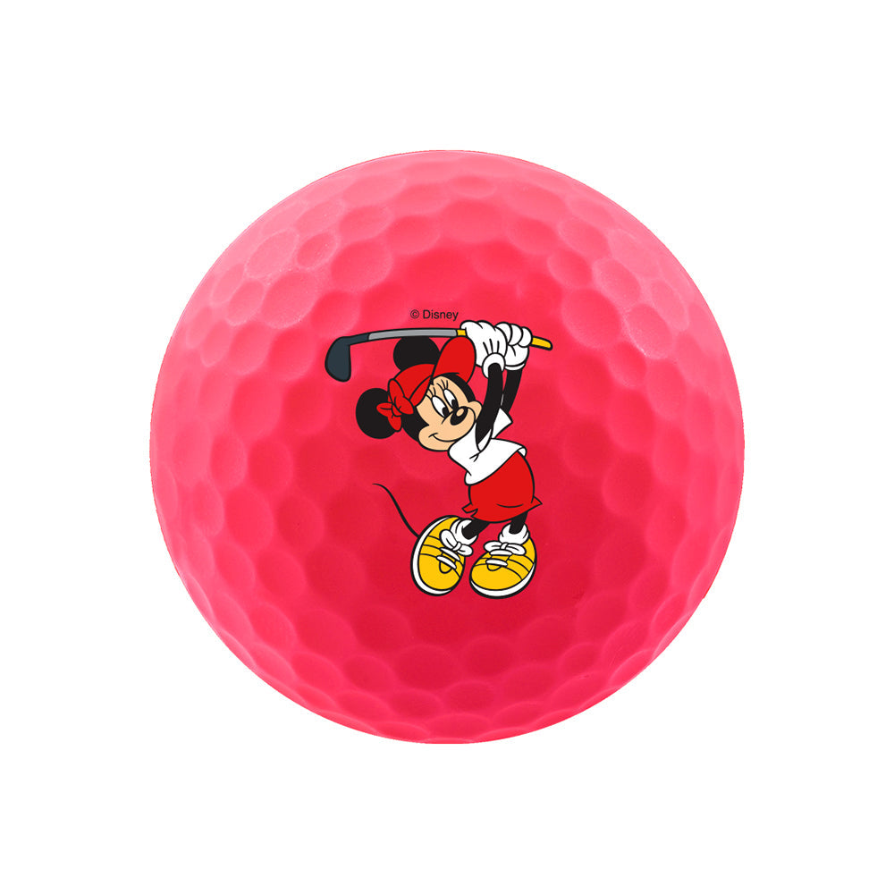 Close-up of a pink Volvik golf ball with Minnie Mouse golf artwork