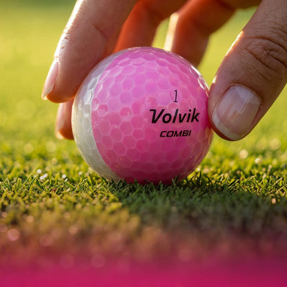 Volvik BCRF Crystal Combi Pink golf balls in a lifestyle scene