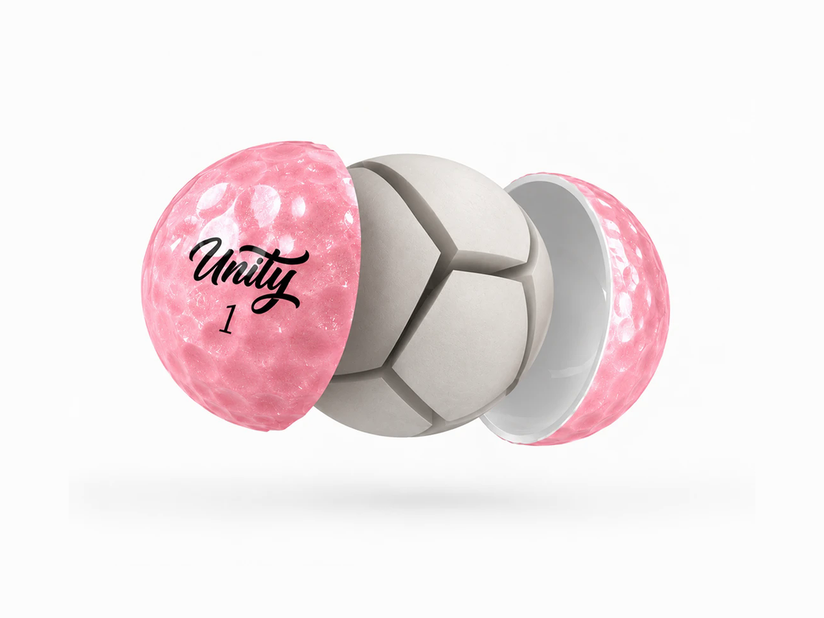 Volvik BCRF Unity golf ball cutaway showing pink pearl cover and titanium core
